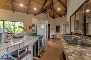Fridge, oven, coffee/tea maker, toaster