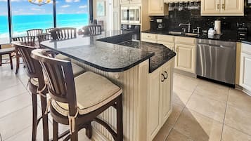 Coffee/tea maker, fridge, microwave, oven