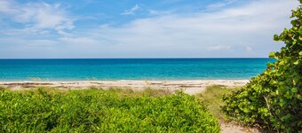 Steps to the Beach. Prime Location. Beach Bungalow Chic.