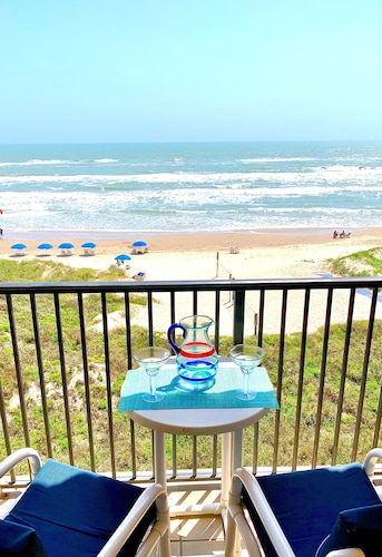 ESCAPE to Bright Top Floor Beachfront Condo in Perfect Location