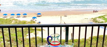 ESCAPE to Bright Top Floor Beachfront Condo in Perfect Location