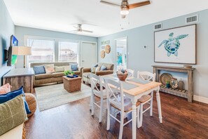 Interior - Natural light fills living room into dining room