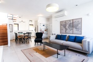 Panoramic Penthouse, 4 Bedrooms | Living area - Chic Duplex Penthouse by FeelHome (Tel Aviv)