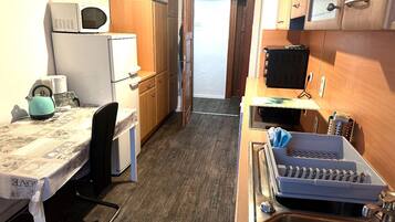 Chambre Simple, salle de bains commune | Cuisine privée