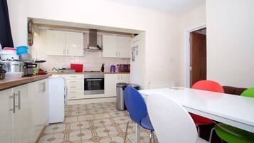 Microwave, electric kettle, cookware/dishes/utensils