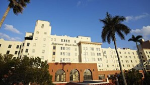 A multi-story building with the sign "Hollywood Beach Resort" indicating it is a hotel.