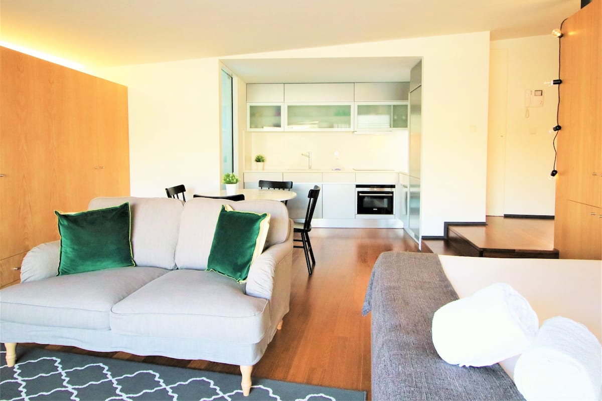 Premium Studio, River View | Living room | Flat-screen TV