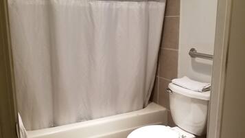 Economy Single Room, 1 Queen Bed | Bathroom | Combined shower/tub, free toiletries, towels