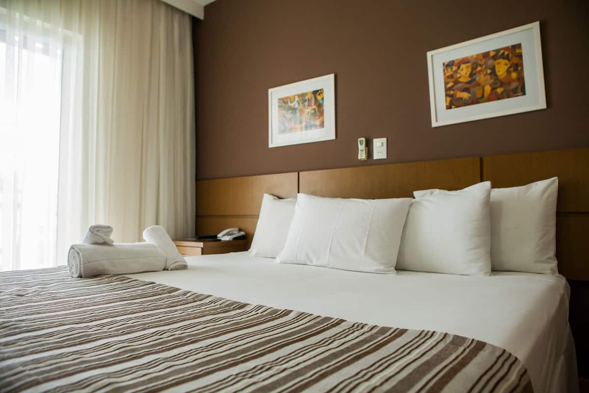 deluxe double room, 1 king bed | 1 bedroom, minibar, desk, blackout curtains