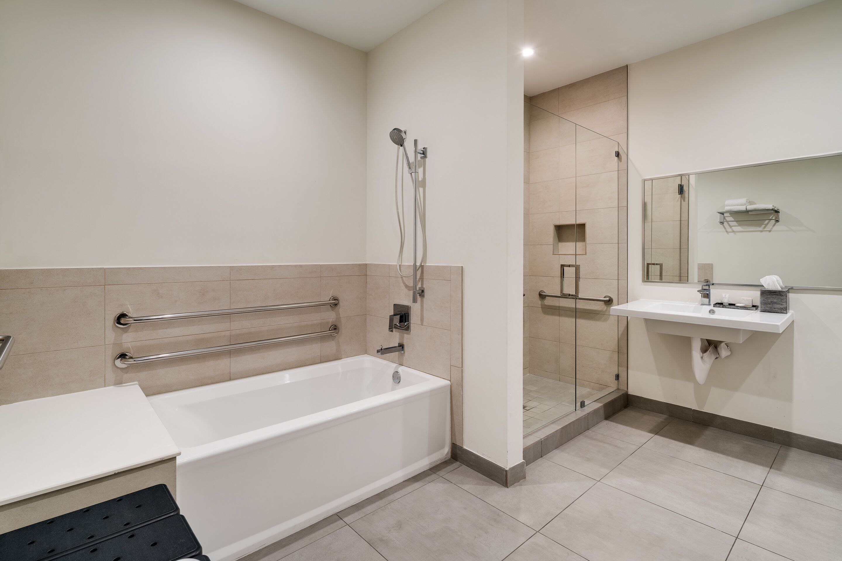 one bedroom suite king accessible | bathroom | free toiletries, hair dryer, towels, soap