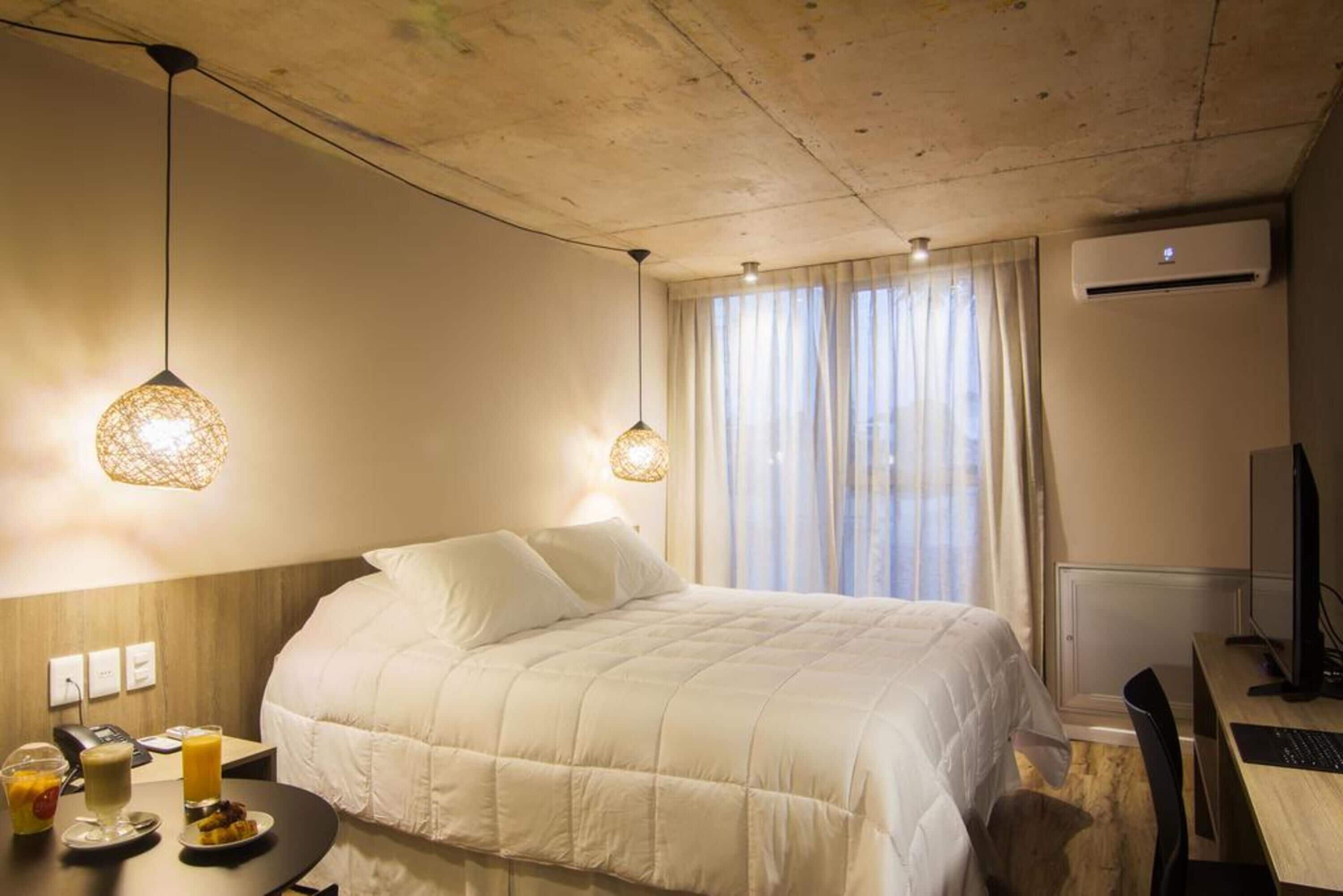 standard double room, city view | premium bedding, minibar, in-room safe, blackout curtains