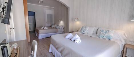 Habitación familiar | Escritorio, wifi gratis y ropa de cama