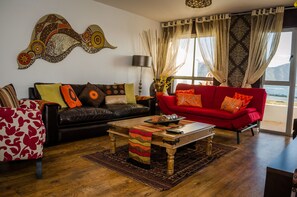 Design Apartment, Sea View | Ruang tamu | TV 
