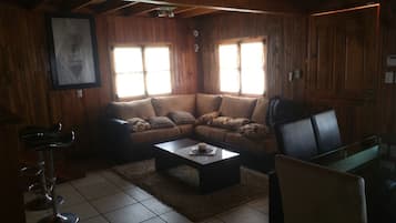 House, 1 Bedroom | Living area | Flat-screen TV