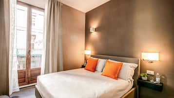 Seprai premium, selimut bulu angsa, busa memori, dan minibar