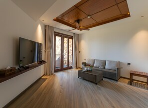 Family Room, Balcony, Pool View | Living area | 55-inch LCD TV with cable channels, TV