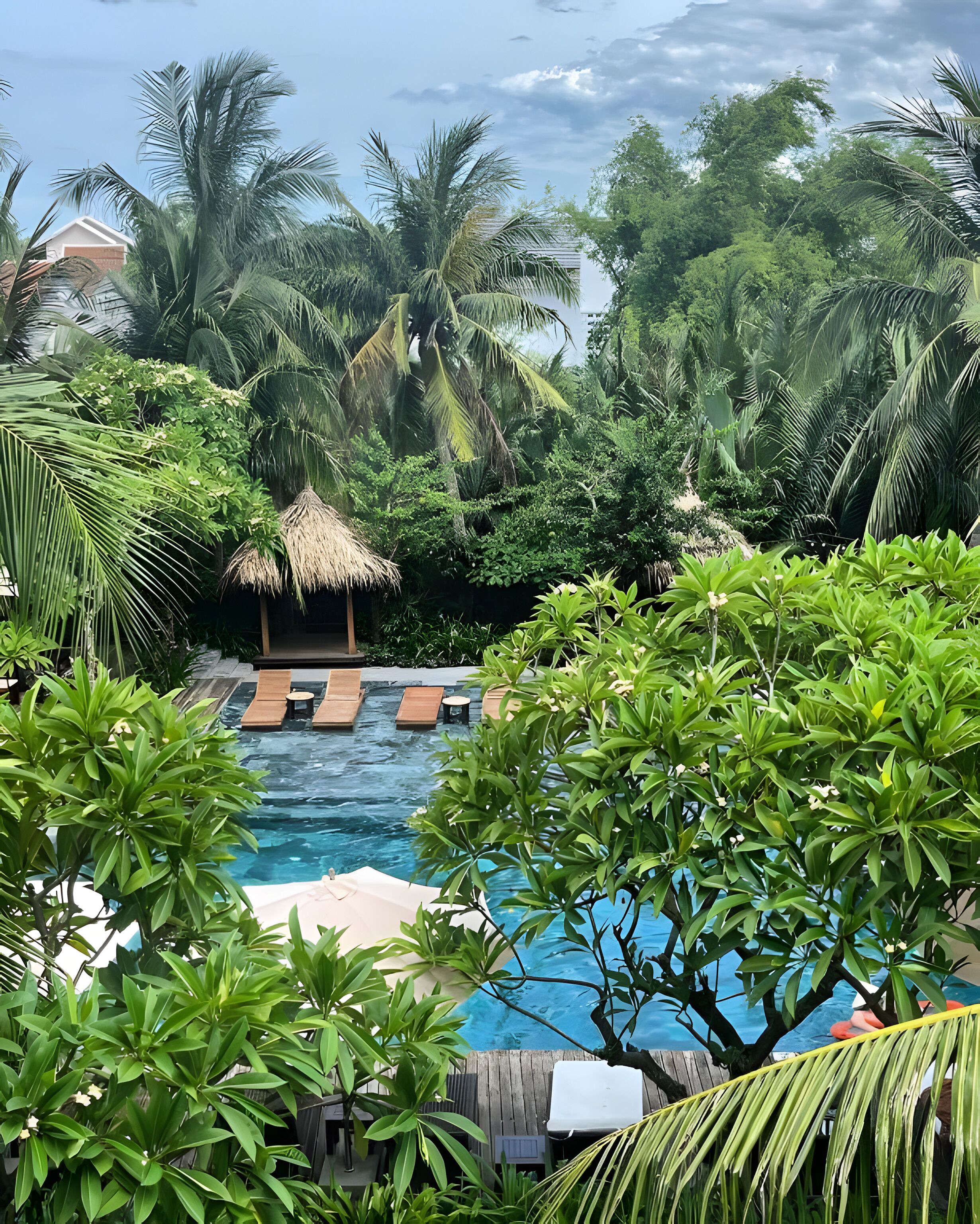 outdoor pool, open 7:30 am to 10 pm, pool umbrellas, pool loungers