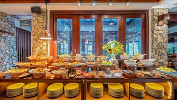 Breakfast, lunch served; local and international cuisine, pool views