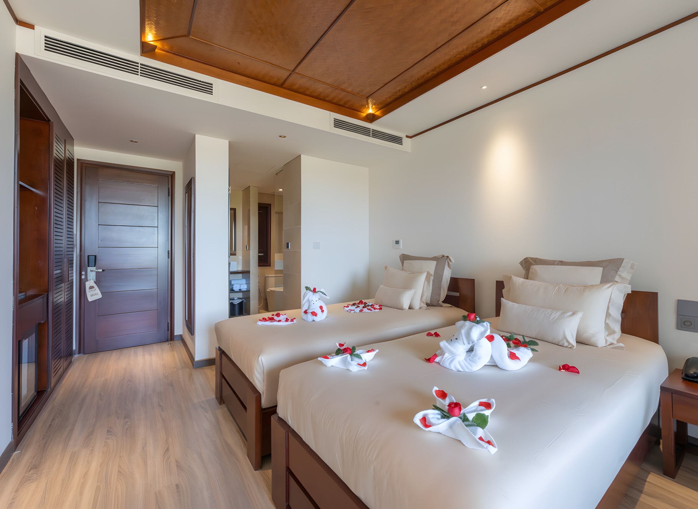 Deluxe Room, Balcony, Pool View | Pillowtop beds, minibar, in-room safe, individually decorated