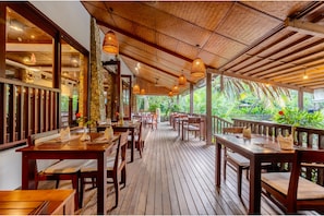 Breakfast, lunch served; local and international cuisine, pool views