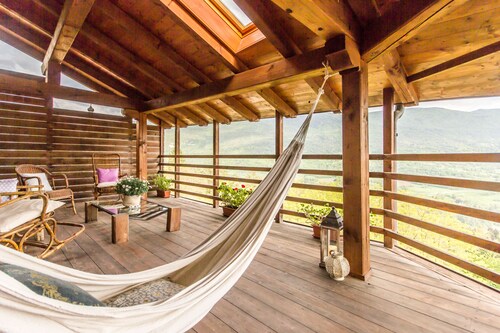 Maso Azzurro Chalet, charming 17th-century barn panoramic terraces fireplace. 