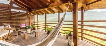 Maso Azzurro Chalet, charming 17th-century barn panoramic terraces fireplace. 