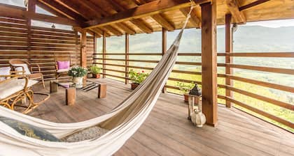 Maso Azzurro Chalet, charming 17th-century barn panoramic terraces fireplace.