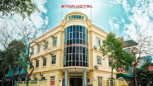 A hotel with a curved facade, large windows, and a prominent 'Star Hotel' sign. - Star Hotel Hai Duong (Hai Phong)