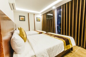 Camera familiare | Minibar, una cassaforte in camera, una scrivania, insonorizzazione