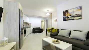 Royal Apartment | Living room | 42-inch flat-screen TV with cable channels, TV