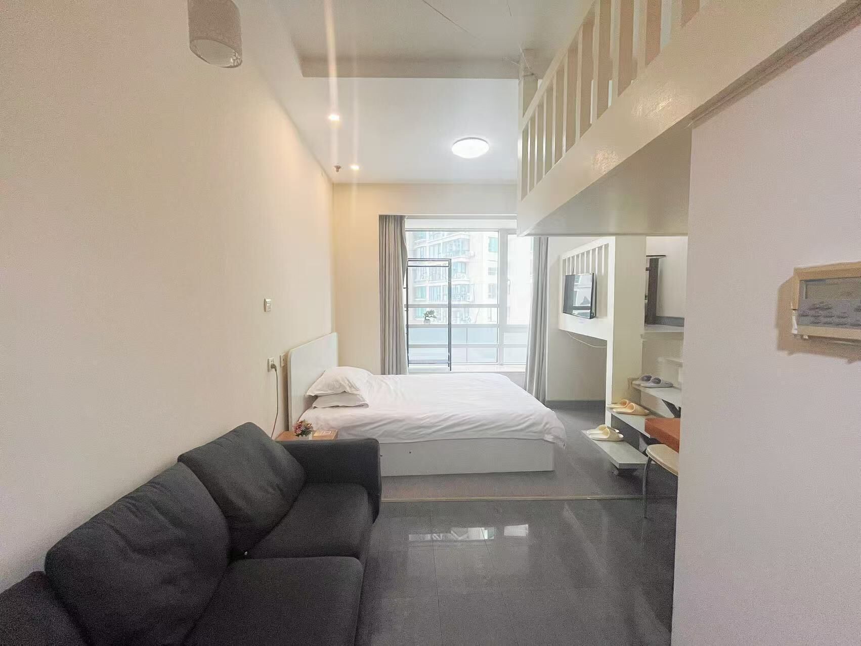 Duplex Family Room | Desk, laptop workspace, blackout drapes, soundproofing