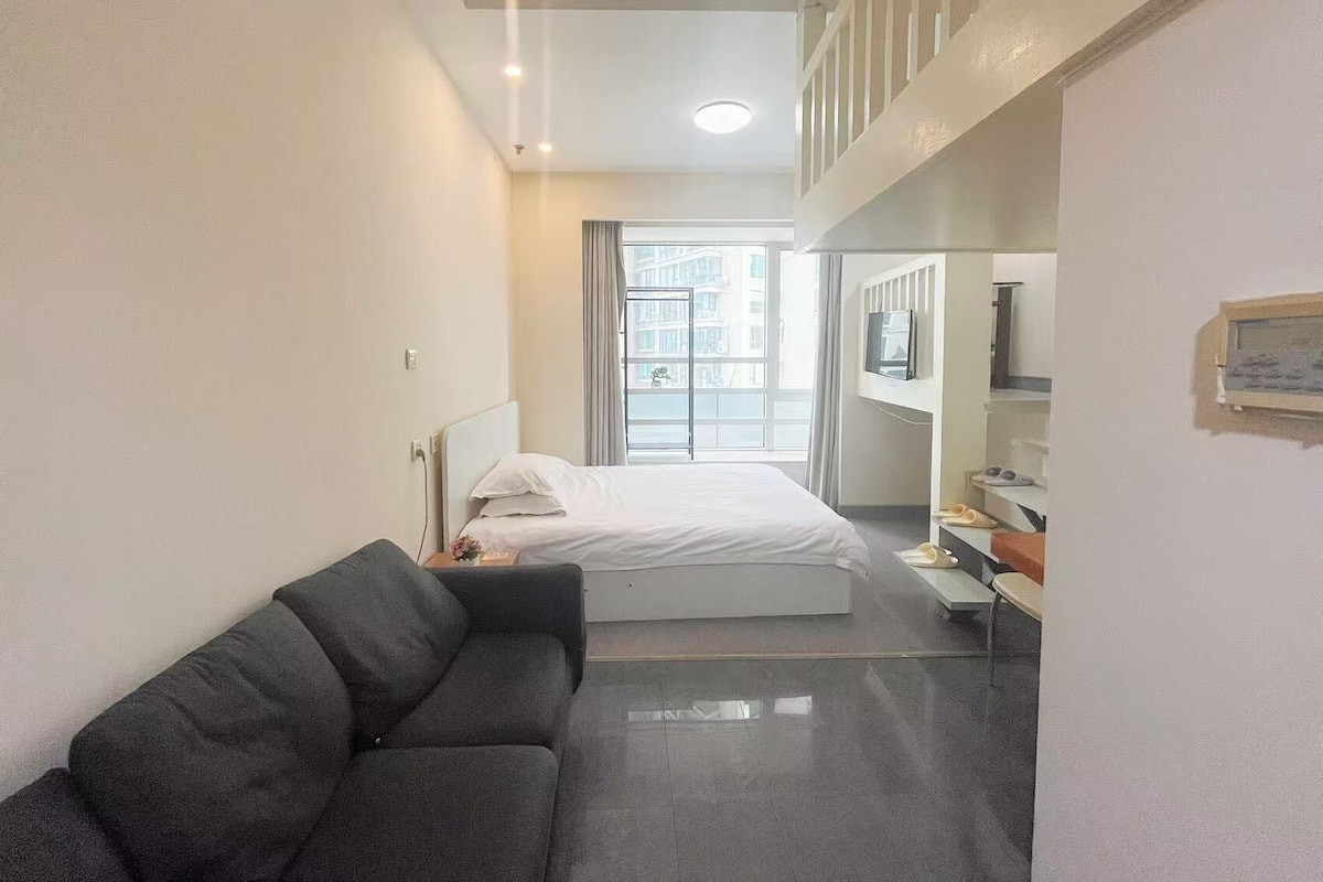 Duplex Family Room | Desk, laptop workspace, blackout drapes, soundproofing