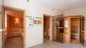 A modern hotel lobby with a sauna, a reception area, and a storage room.