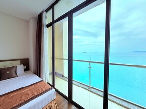 Deluxe Quadruple Room, 1 Bedroom, Sea View | Premium bedding, minibar, in-room safe, desk - Lenid Nha Trang Hotel (Nha Trang)