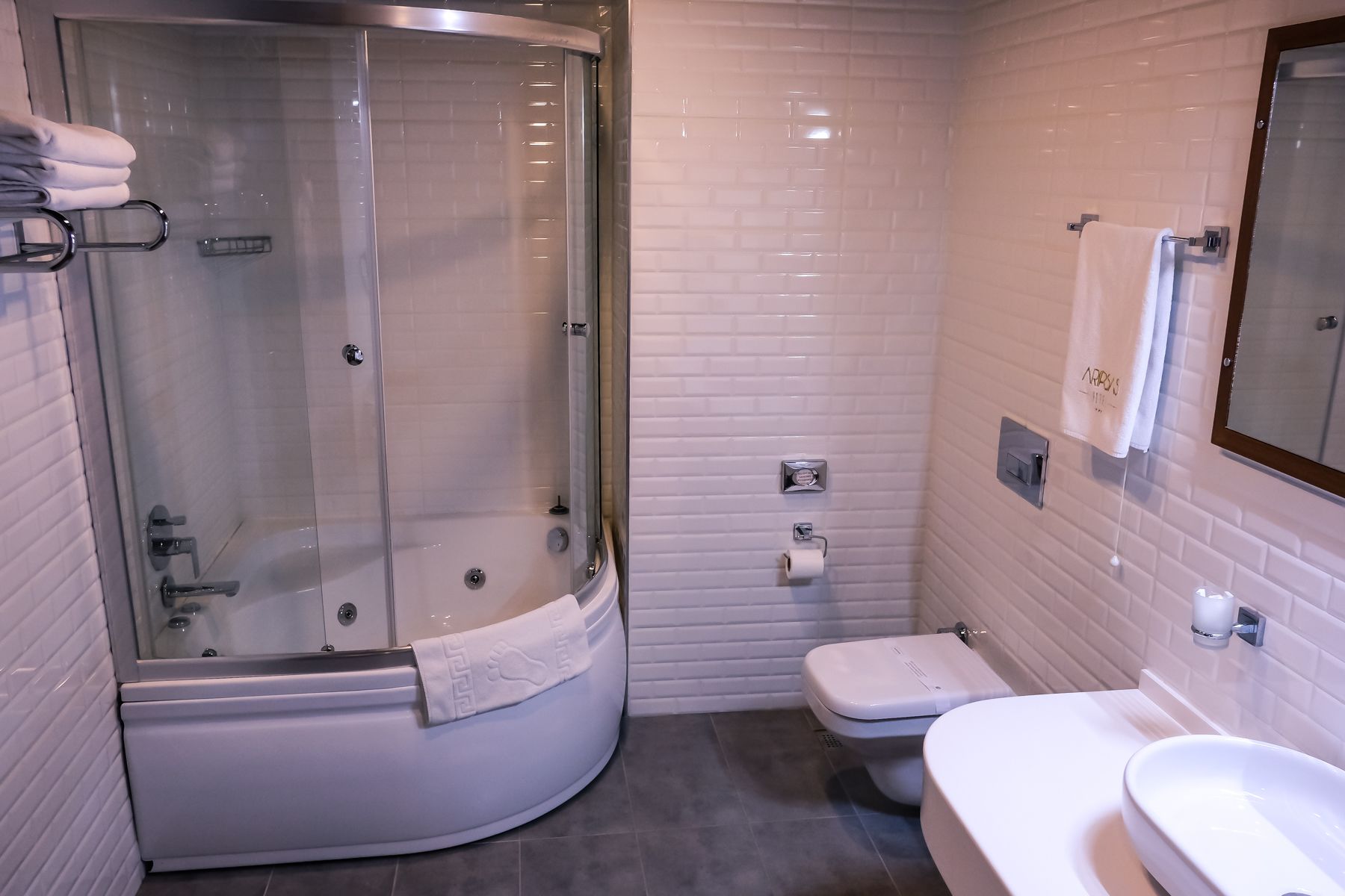 family suite | bathroom | free toiletries, hair dryer, slippers, towels