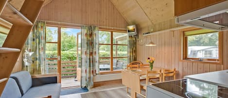 Luxury Cabin, Private Bathroom | Living area | TV