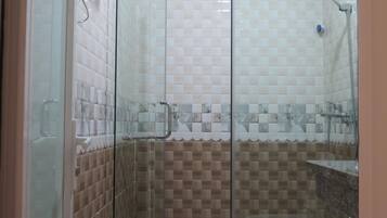 Shower, free toiletries, hair dryer, slippers