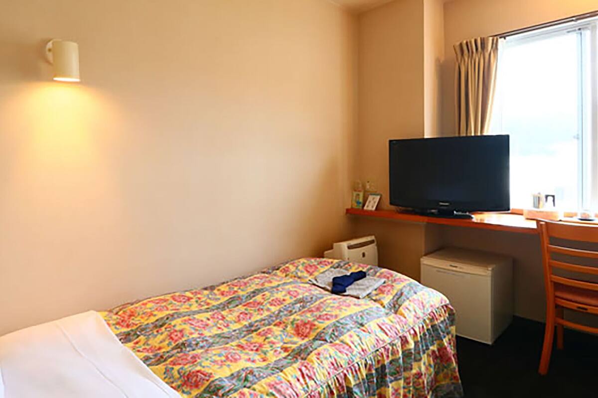 western style single room | in-room safe, desk, free wifi