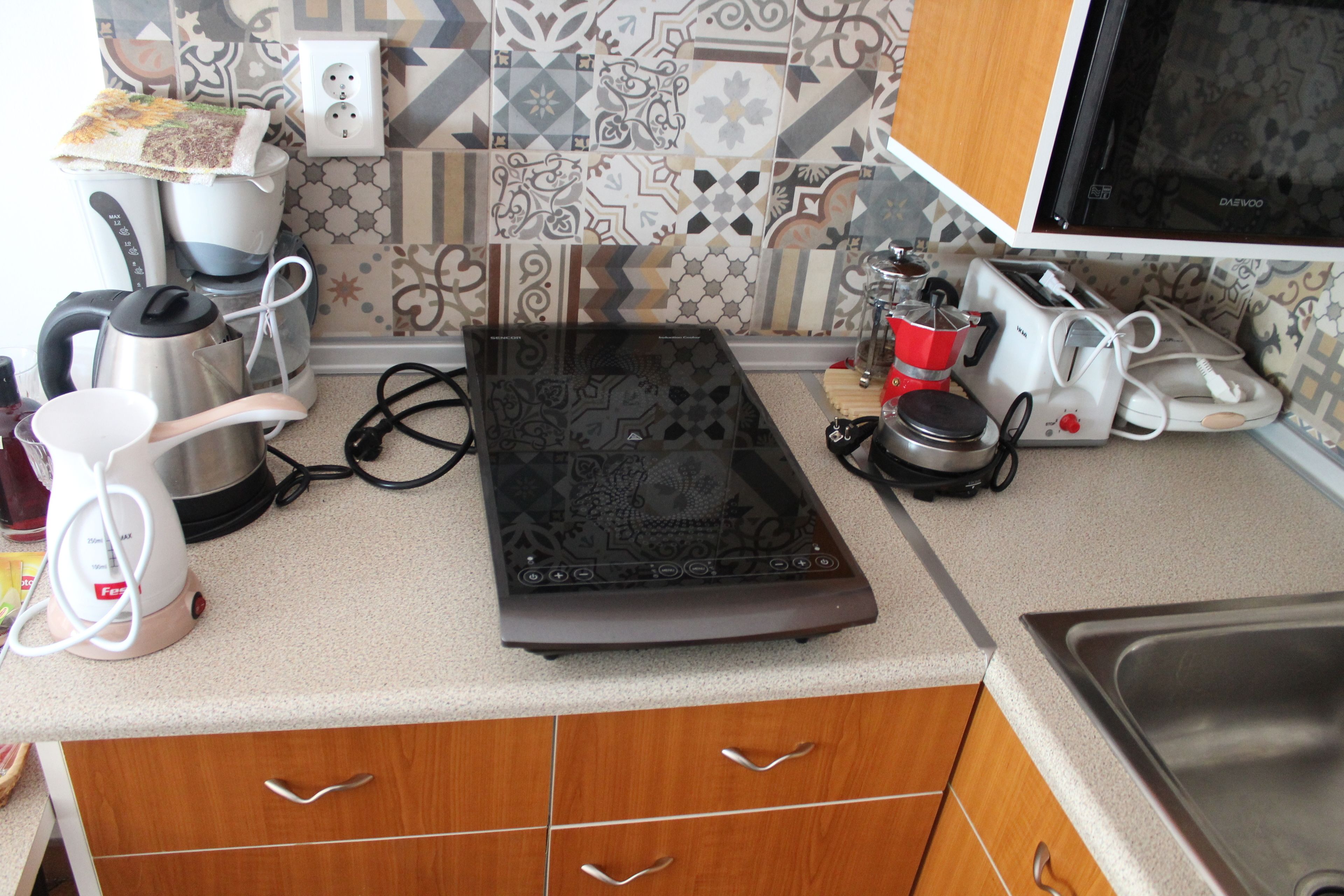 Deluxe Apartment, 1 Bedroom, Terrace, Sea View | Private kitchen | Fridge, microwave, stovetop, coffee/tea maker