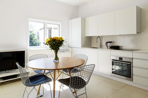 City Apartment, 2 Bedrooms | Private kitchen | Full-sized fridge, microwave, oven, stovetop - Relax & Sunny near Beach by FeelHome (Tel Aviv)