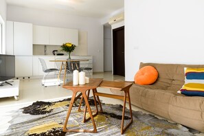 City Apartment, 2 Bedrooms | Living area | Smart TV - Relax & Sunny near Beach by FeelHome (Tel Aviv)