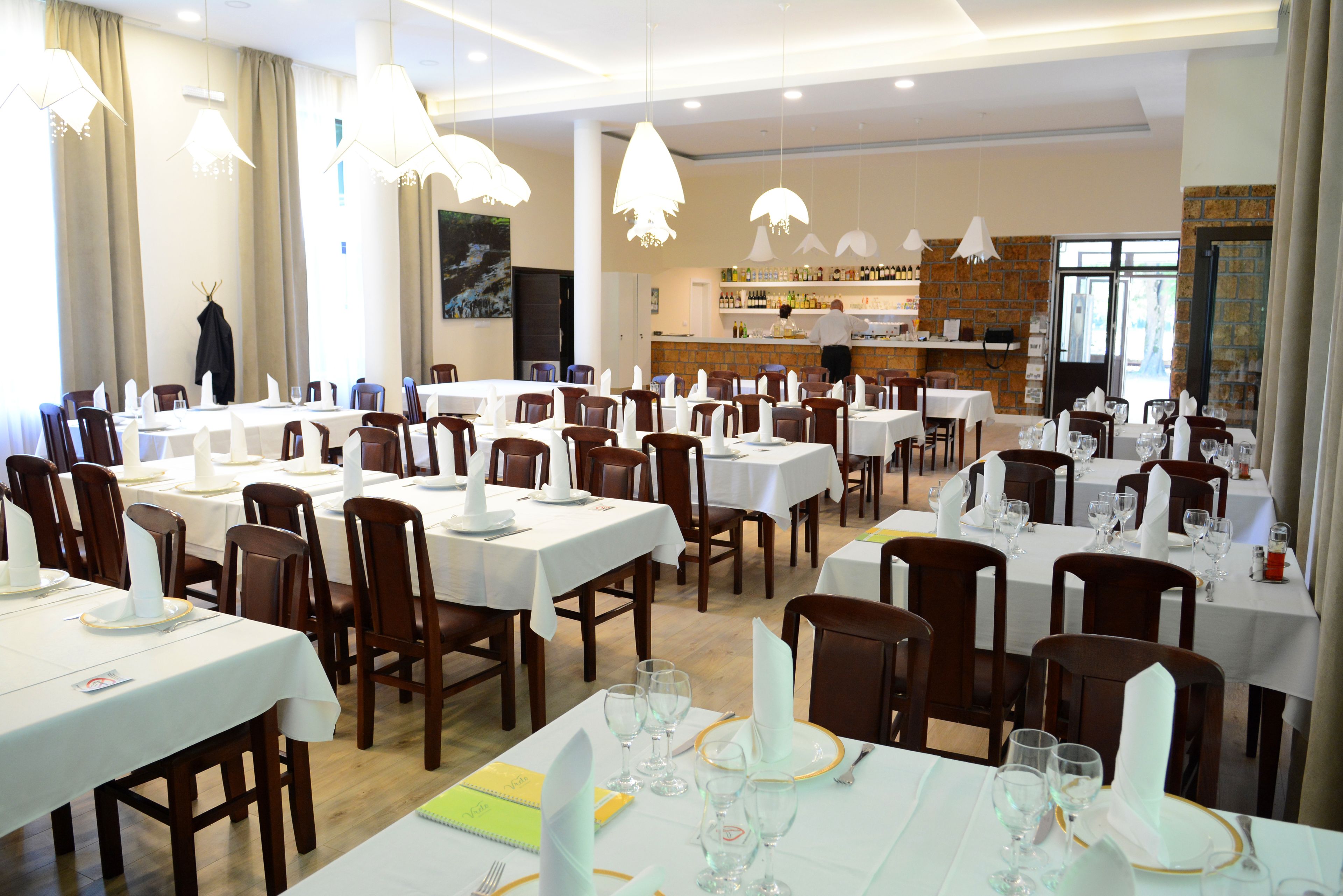 Breakfast, lunch, dinner served; local cuisine 