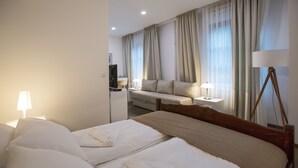 Kamar Single Deluks | Minibar, brankas, meja kerja, dan kedap suara