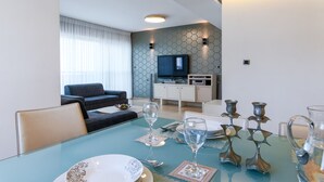 Family Apartment, 3 Bedrooms, Balcony | In-room dining - Comfort & Balcony near Beach by FeelHome (Tel Aviv)