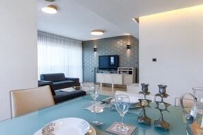 Family Apartment, 3 Bedrooms, Balcony | In-room dining - Comfort & Balcony near Beach by FeelHome (Tel Aviv)