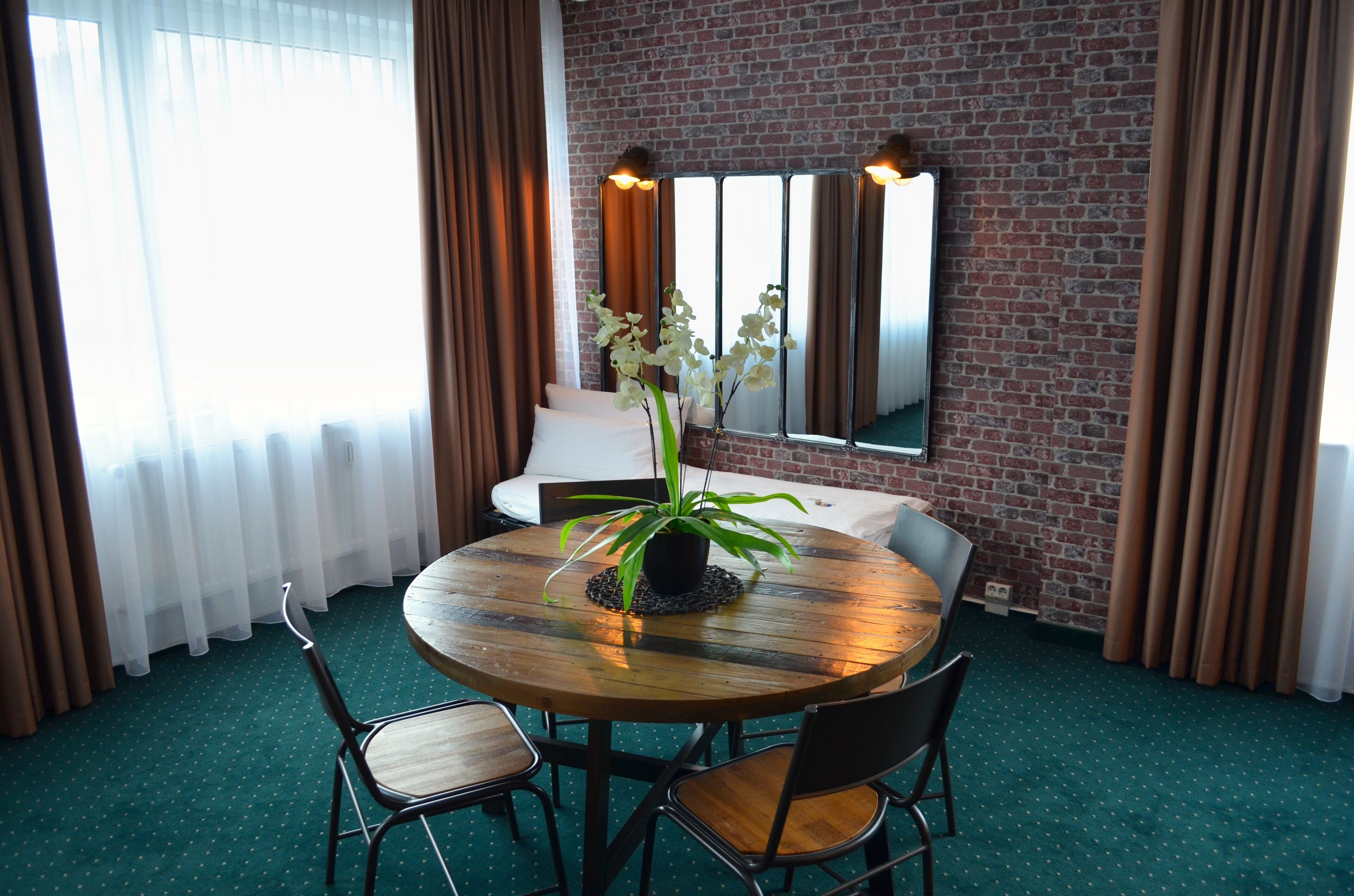 Family Quadruple Room | Living area | 32-inch flat-screen TV with cable channels, TV