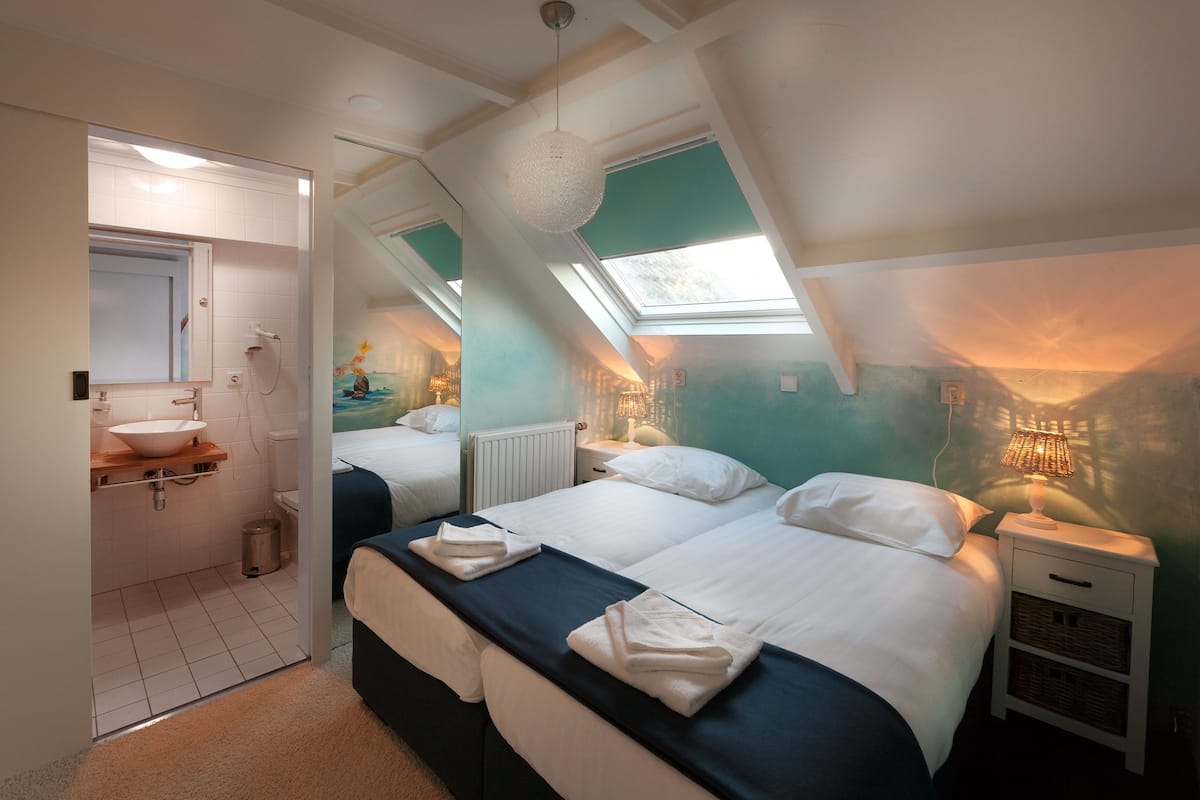 family apartment, 3 bedrooms | desk, iron/ironing board, cots/infant beds, rollaway beds