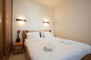 Appartement Confort, 1 chambre | 1 chambre, rideaux d’obscurcissement, fer et planche à repasser