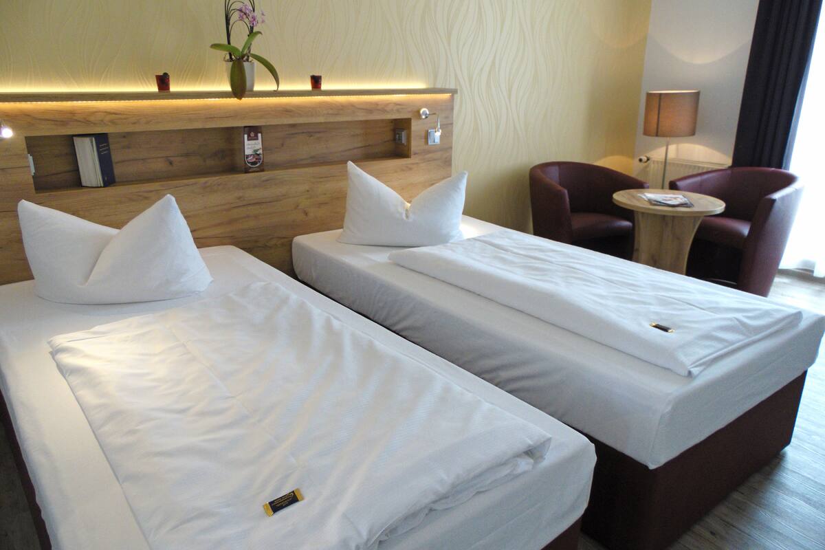 comfort double or twin room | in-room safe, desk, free cots/infant beds, rollaway beds