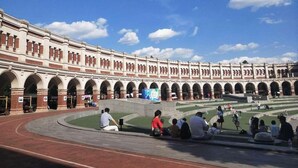 A large, historic building with multiple arches and a central courtyard. - 7 Days Inn (Tianjin)